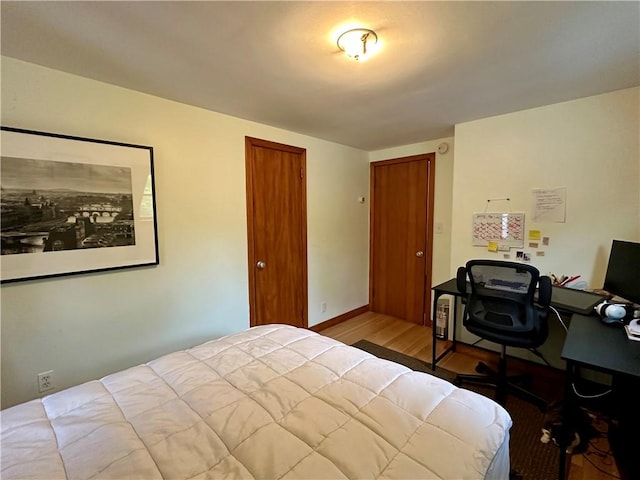 32 Bon Air Ave, Bradford-City, PA 16701 - bedroom with wood finished floors, a desk, and baseboards