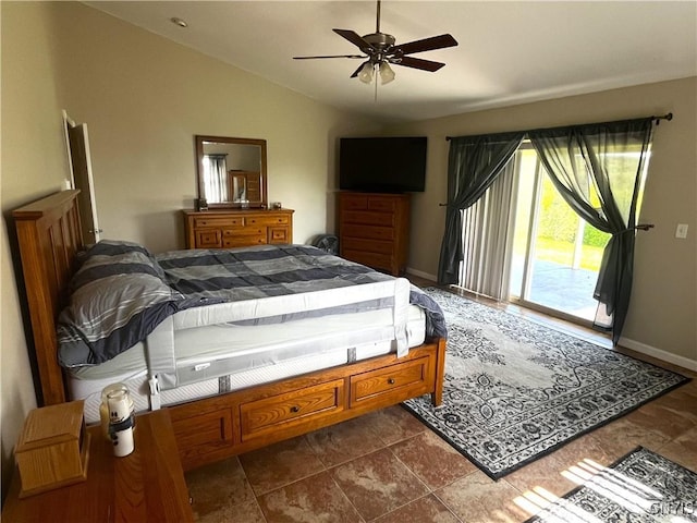 7290 State Route 80, Fabius, NY 13063 - bedroom with access to outside, vaulted ceiling, a ceiling fan, and baseboards