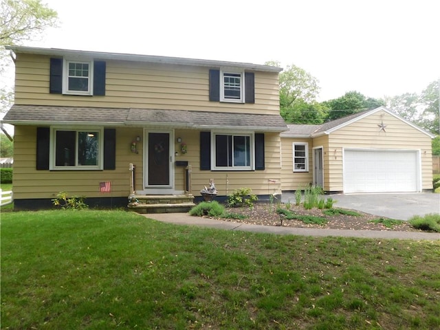 8 Dayne St, Irondequoit, NY 14622 - view of front of property featuring driveway, an attached garage, and a front lawn
