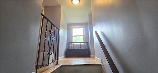 8 Dayne St, Irondequoit, NY 14622 - stairway with baseboards and wood finished floors