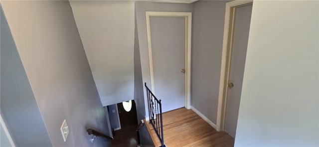 8 Dayne St, Irondequoit, NY 14622 - staircase featuring wood finished floors