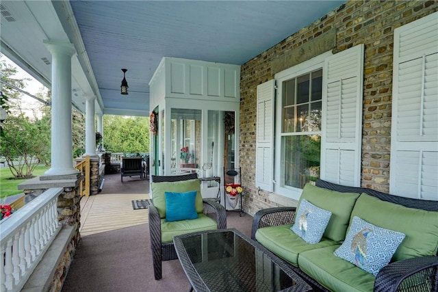 3402 W Lake Rd, Canandaigua Town, NY 14424 - covered porch featuring an outdoor living space