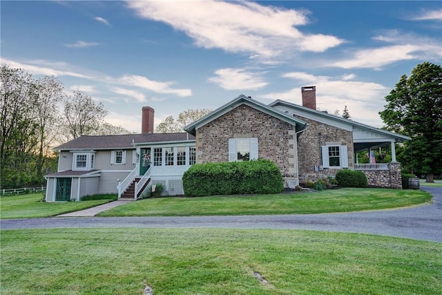 3402 W Lake Rd, Canandaigua Town, NY 14424 - single story home with a chimney, a front yard, and stairs