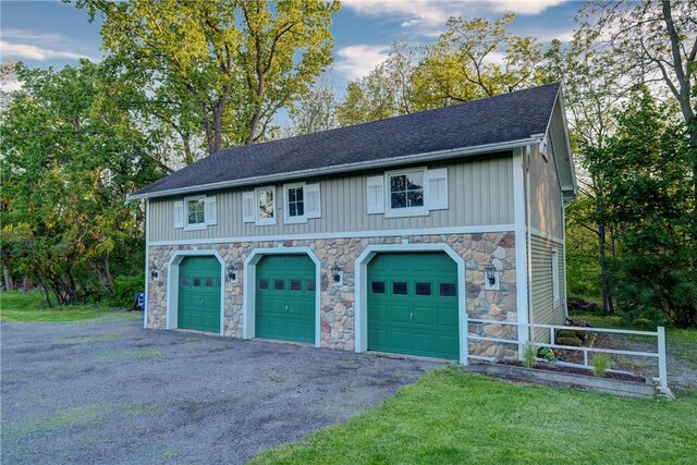 3402 W Lake Rd, Canandaigua Town, NY 14424 - garage with asphalt driveway