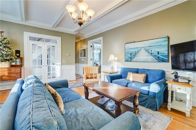 3402 W Lake Rd, Canandaigua Town, NY 14424 - living area featuring a chandelier, french doors, wood finished floors, a wainscoted wall, and ornamental molding