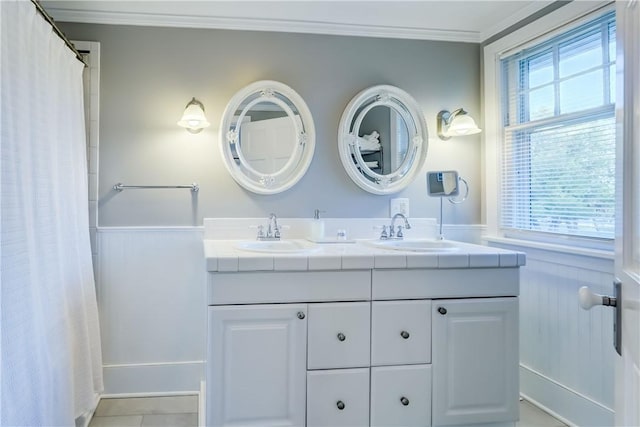 3402 W Lake Rd, Canandaigua Town, NY 14424 - bathroom featuring double vanity, ornamental molding, wainscoting, and a shower with curtain