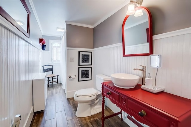 3402 W Lake Rd, Canandaigua Town, NY 14424 - bathroom featuring wainscoting, ornamental molding, vanity, toilet, and wood finished floors