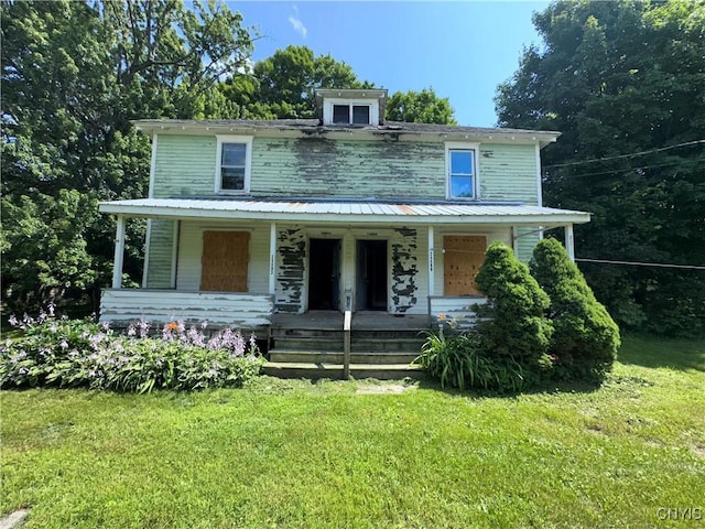 24593 Back St Unit 599, Rutland, NY 13638 - traditional style home with a front yard and covered porch