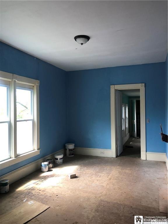 915 N Main St, Jamestown, NY 14701 - empty room featuring baseboards