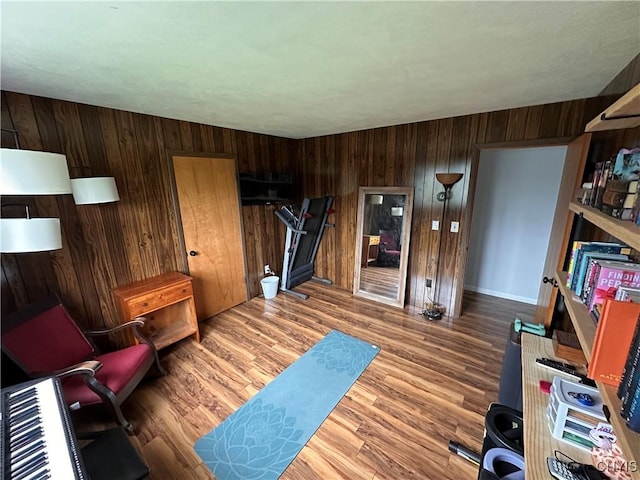 5030 Lincklaen Rd, Cuyler, NY 13158 - exercise area featuring wood walls and wood finished floors