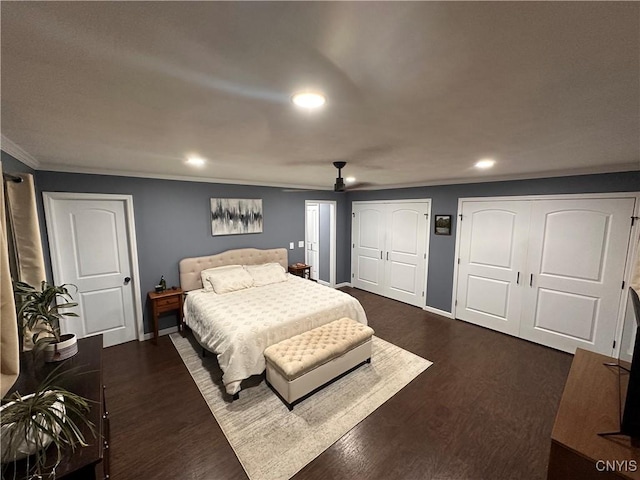 5030 Lincklaen Rd, Cuyler, NY 13158 - bedroom featuring crown molding, recessed lighting, multiple closets, dark wood-style floors, and baseboards