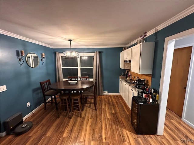 5030 Lincklaen Rd, Cuyler, NY 13158 - dining area featuring dark wood finished floors, ornamental molding, baseboards, and a dry bar