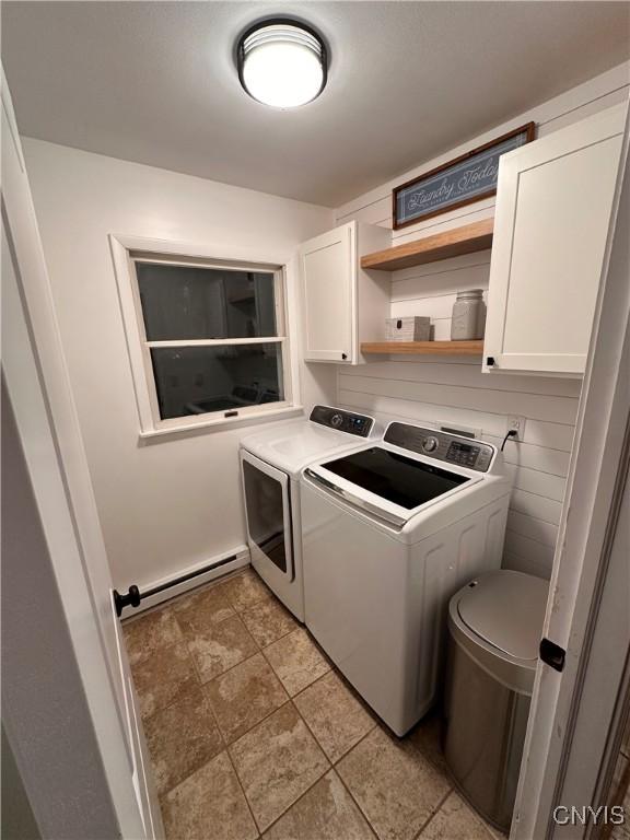 5030 Lincklaen Rd, Cuyler, NY 13158 - laundry room with cabinet space, a baseboard heating unit, and independent washer and dryer