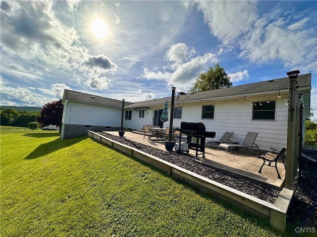 5030 Lincklaen Rd, Cuyler, NY 13158 - rear view of house with a patio area and a yard