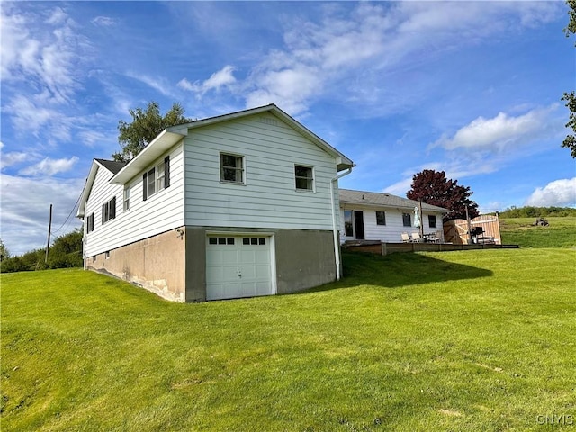 5030 Lincklaen Rd, Cuyler, NY 13158 - rear view of property featuring a yard, an attached garage, and a deck