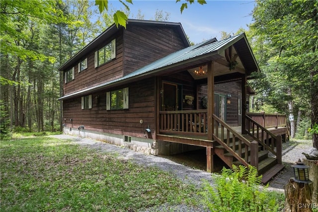 12103 Kincaid Rd, Forestport, NY 13338 - back of house featuring metal roof