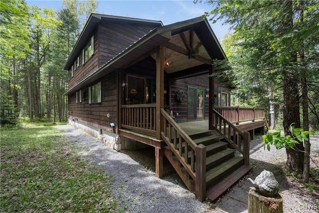 12103 Kincaid Rd, Forestport, NY 13338 - view of property exterior with crawl space and a wooden deck