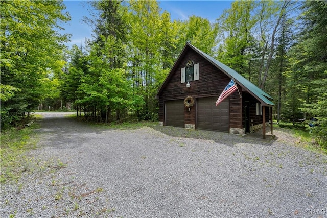 12103 Kincaid Rd, Forestport, NY 13338 - view of side of property featuring a garage and an outbuilding