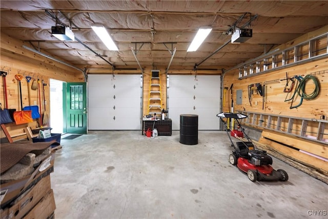 12103 Kincaid Rd, Forestport, NY 13338 - garage with a garage door opener and electric panel