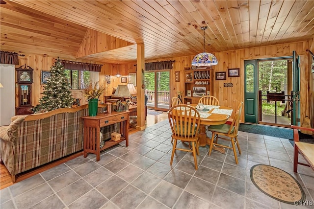 12103 Kincaid Rd, Forestport, NY 13338 - tiled dining space featuring wooden walls and wooden ceiling