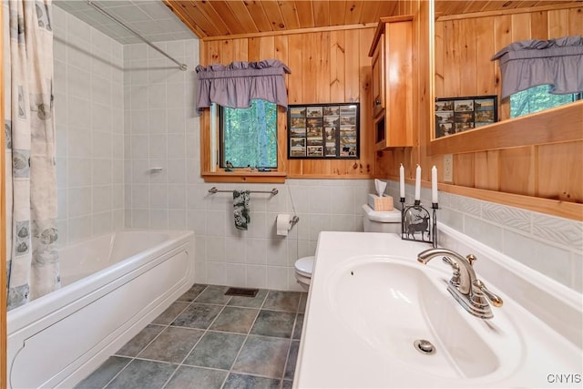 12103 Kincaid Rd, Forestport, NY 13338 - bathroom with wooden ceiling, shower / bath combination with curtain, toilet, vanity, and wooden walls