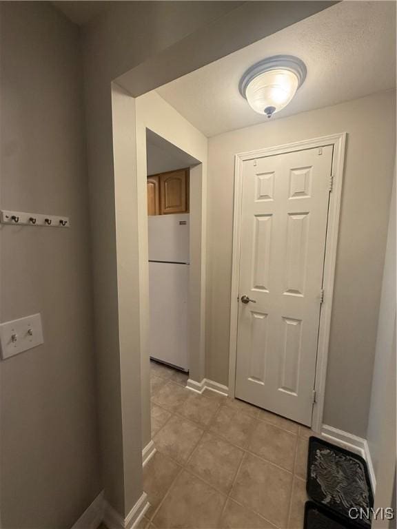 137 Watertree Dr, Dewitt, NY 13057 - hall with light tile patterned floors and baseboards