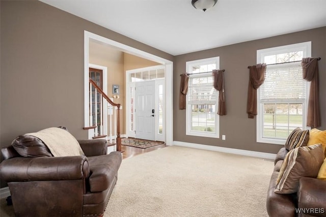 82 Arcadian Dr, Amherst, NY 14228 - foyer entrance featuring carpet, baseboards, and stairway