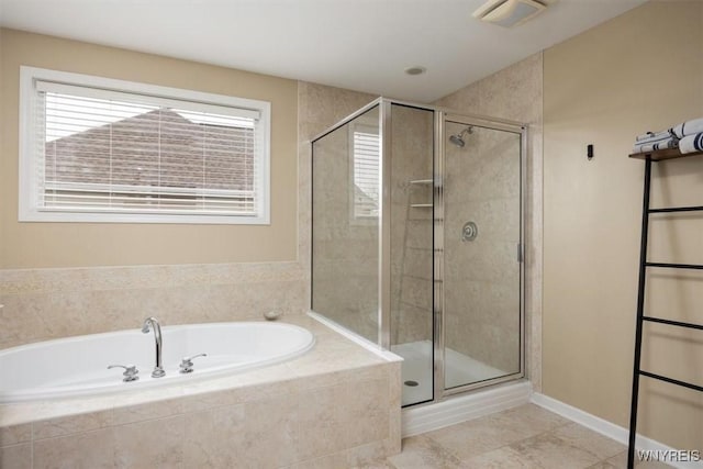 82 Arcadian Dr, Amherst, NY 14228 - bathroom featuring a bath, a shower stall, and tile patterned flooring
