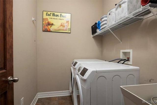 82 Arcadian Dr, Amherst, NY 14228 - washroom with washing machine and clothes dryer and baseboards