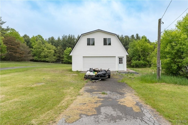 29580/584 Maple St Unit 584, Le Ray, NY 13612 - garage featuring driveway