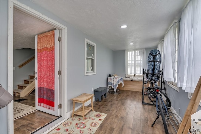 29580/584 Maple St Unit 584, Le Ray, NY 13612 - exercise area featuring wood finished floors, recessed lighting, and a textured ceiling