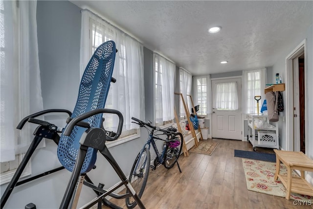 29580/584 Maple St Unit 584, Le Ray, NY 13612 - entrance foyer with hardwood / wood-style flooring, a textured ceiling, and recessed lighting