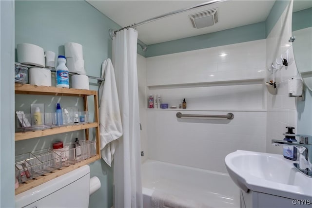 29580/584 Maple St Unit 584, Le Ray, NY 13612 - bathroom with toilet, vanity, and shower / bath combo