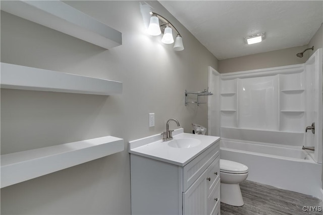 29580/584 Maple St Unit 584, Le Ray, NY 13612 - full bathroom with toilet, vanity, shower / bath combination, and wood finished floors
