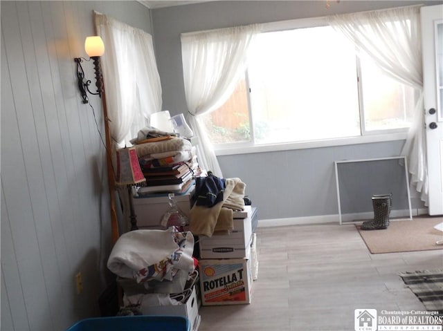 123 N Dow St, Ellicott, NY 14733 - interior space with wood finished floors, baseboards, and wooden walls