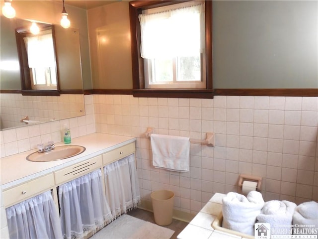 123 N Dow St, Ellicott, NY 14733 - bathroom with vanity and tile walls