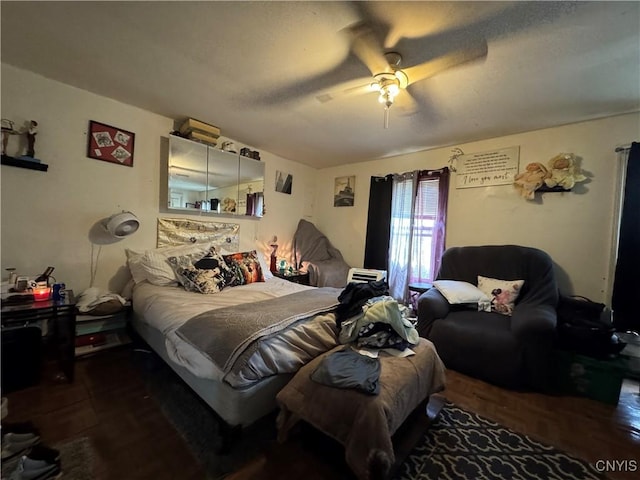 403 Coffeen St, Watertown-City, NY 13601 - bedroom featuring a ceiling fan and wood finished floors