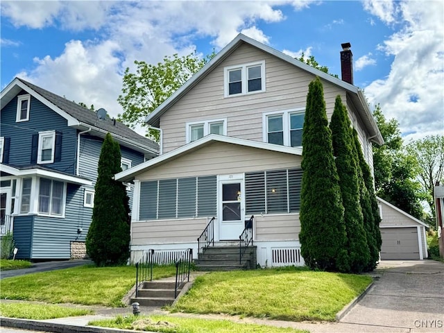 171 Maplehurst Ave, Syracuse, NY 13208 - traditional style home with entry steps, a chimney, an outbuilding, and a front yard