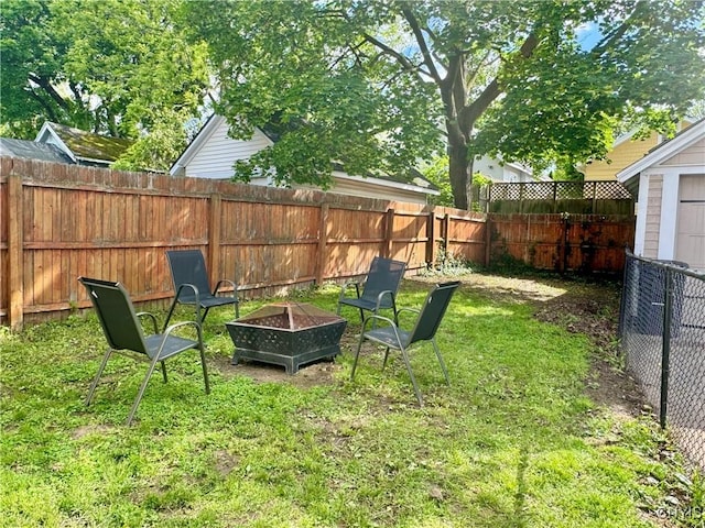 171 Maplehurst Ave, Syracuse, NY 13208 - view of yard featuring an outdoor fire pit