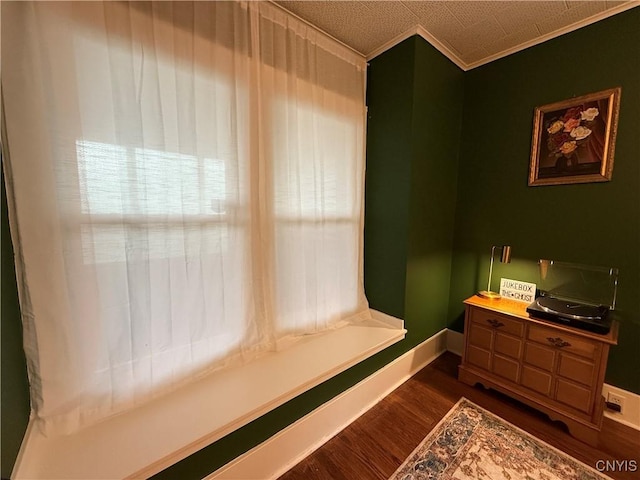 171 Maplehurst Ave, Syracuse, NY 13208 - living area featuring dark wood finished floors, crown molding, and baseboards