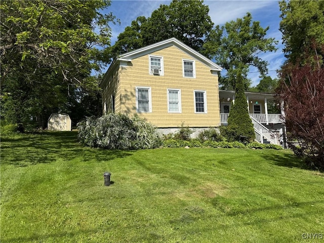 58 S Hamilton St, Elbridge, NY 13080 - back of property featuring a lawn