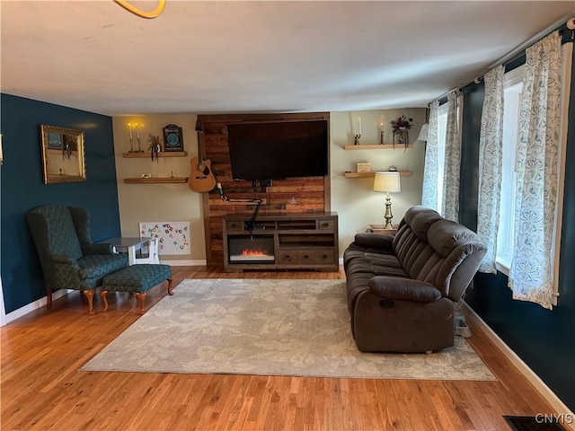 58 S Hamilton St, Elbridge, NY 13080 - living area with baseboards and wood finished floors