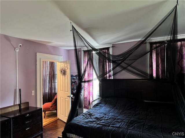 58 S Hamilton St, Elbridge, NY 13080 - bedroom with dark wood finished floors