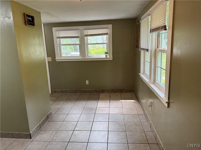 58 S Hamilton St, Elbridge, NY 13080 - spare room featuring baseboards and light tile patterned floors