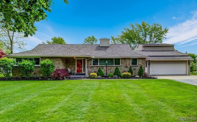 515 Park Club Ln, Amherst, NY 14221 - view of front of house featuring stone siding, a chimney, a garage, and a front yard