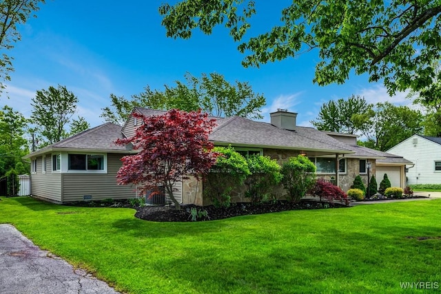 515 Park Club Ln, Amherst, NY 14221 - view of front of house featuring a front lawn, a chimney, stone siding, and roof with shingles