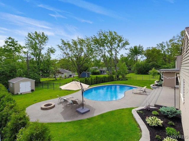 515 Park Club Ln, Amherst, NY 14221 - view of swimming pool with an outdoor fire pit, a patio area, and view of scattered trees