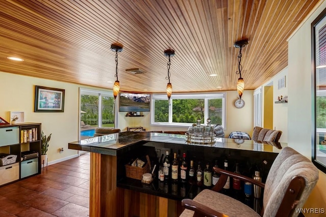 515 Park Club Ln, Amherst, NY 14221 - kitchen with wooden ceiling, pendant lighting, and dark tile patterned floors