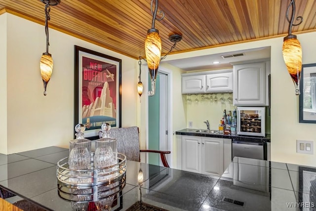 515 Park Club Ln, Amherst, NY 14221 - indoor wet bar featuring dishwashing machine, wood ceiling, and pendant lighting