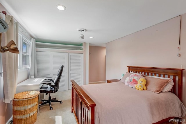 515 Park Club Ln, Amherst, NY 14221 - bedroom featuring a closet, an office area, light carpet, and recessed lighting